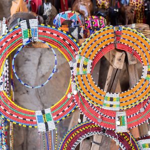 Colorful Maasai bead necklaces and other jewelry sold as a souvenirs at a local Maasai Market.